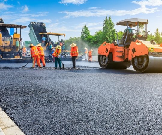 Construction,Site,Is,Laying,New,Asphalt,Road,Pavement,road,Construction,Workers
